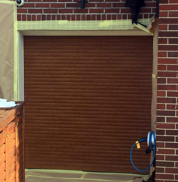 Before garage door refurbishment